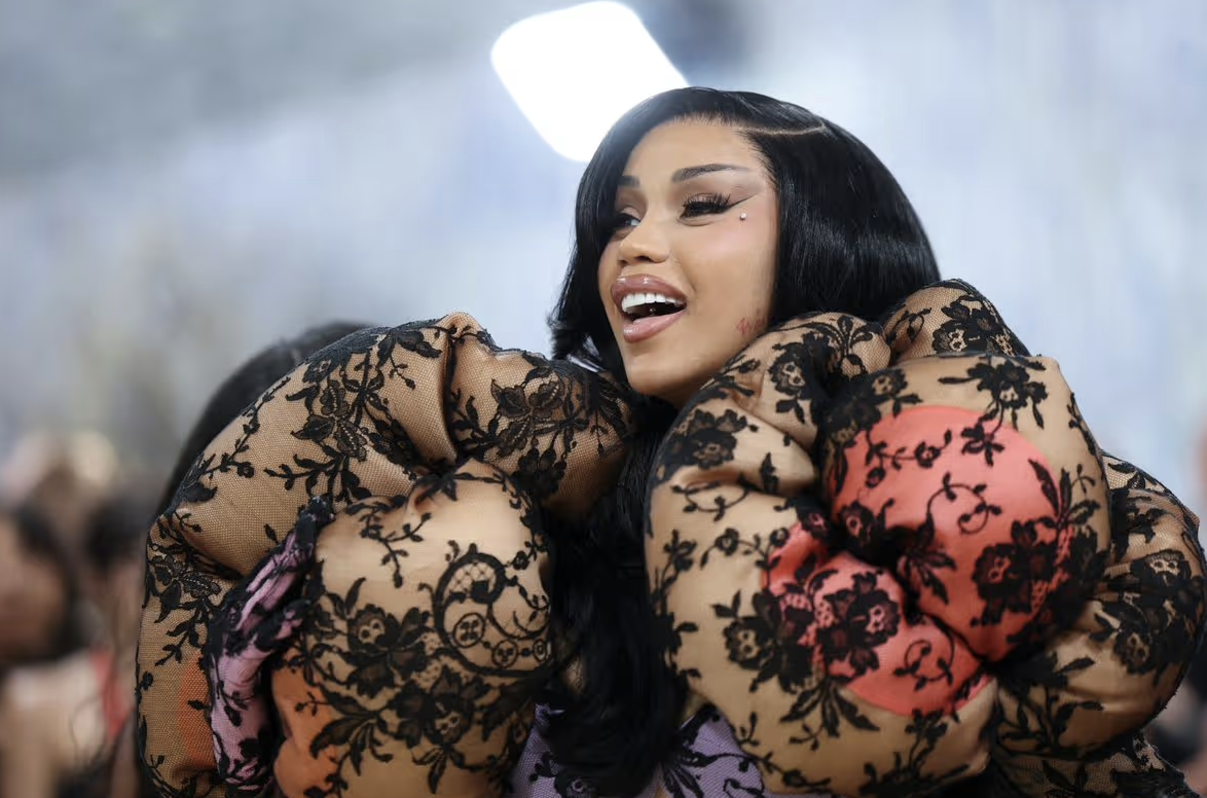 Cardi B shows up to Met Gala In Skin Tight Black Lace & Teal Mermaid Gown